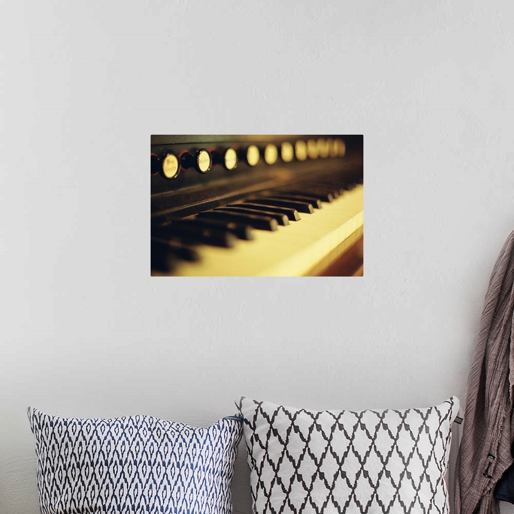 A bohemian room featuring Piano keys and buttons.