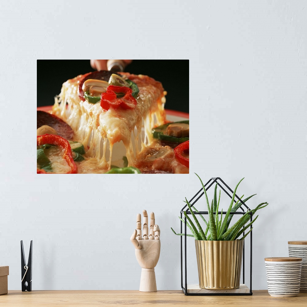 A bohemian room featuring Pizza with bell peppers