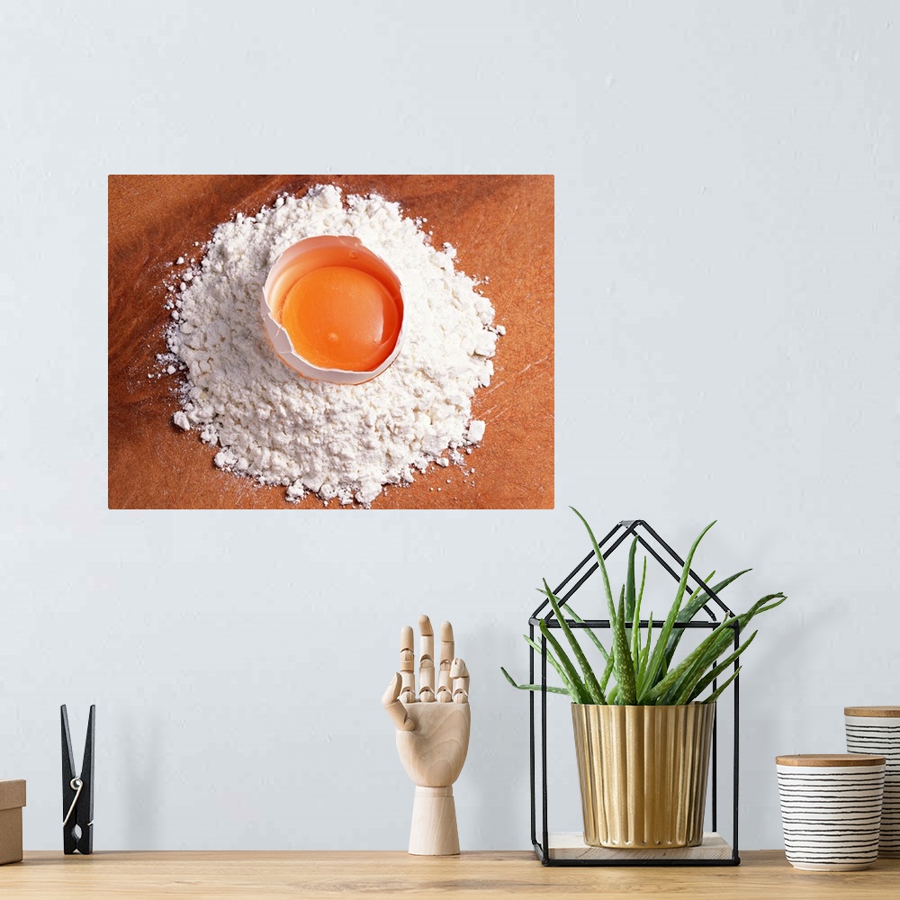 A bohemian room featuring Raw egg sitting on wheat flour
