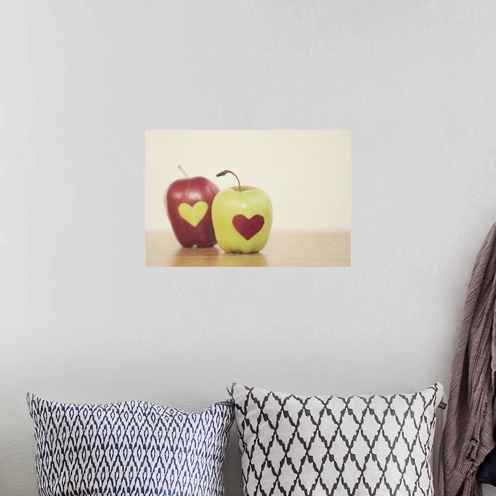 A bohemian room featuring Red and green apple with heart shape.