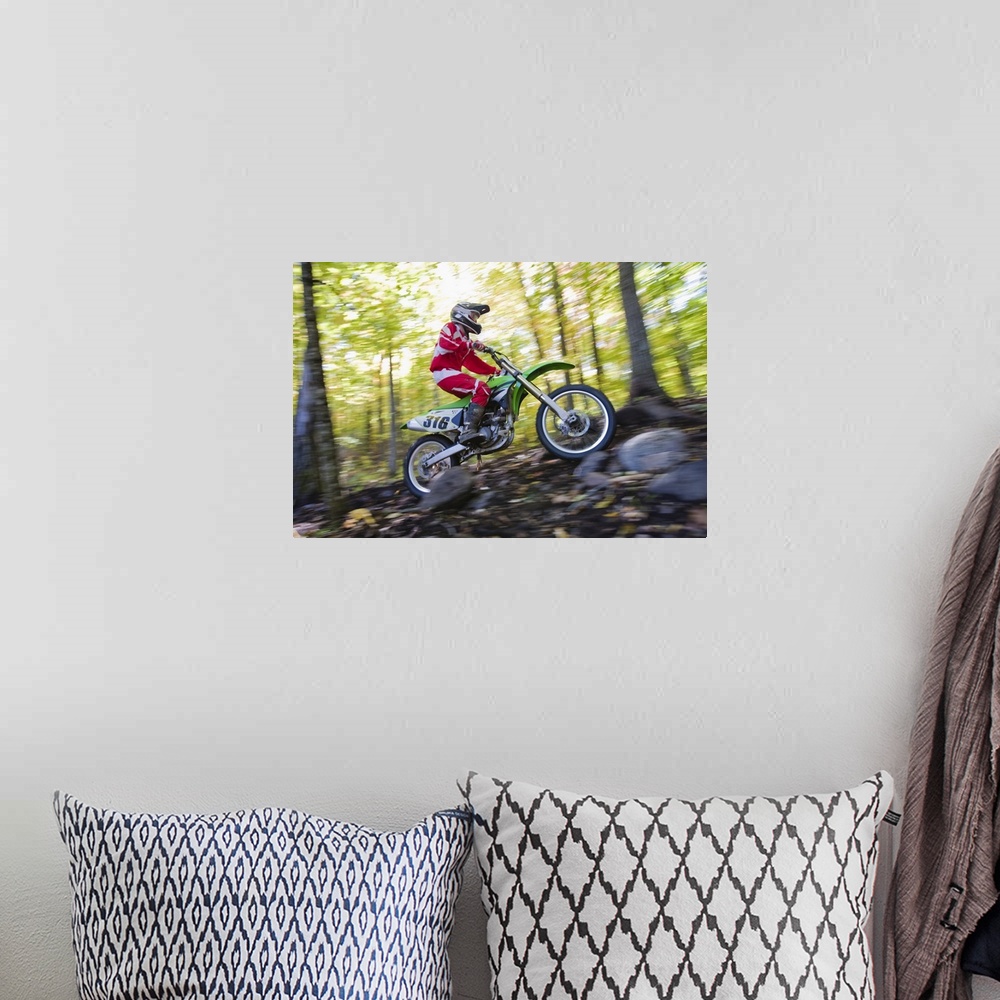 A bohemian room featuring Rider on dirt bike