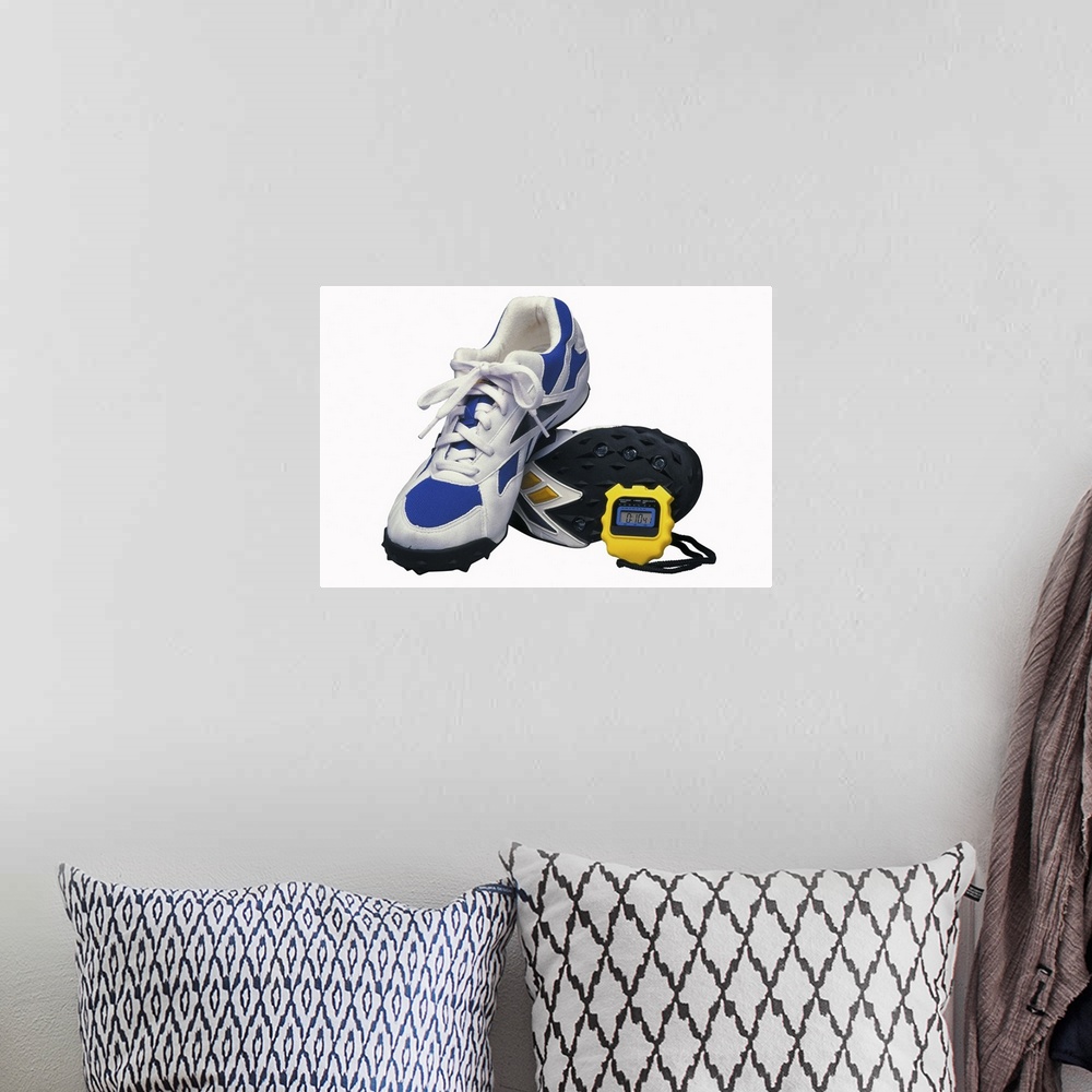 A bohemian room featuring Running shoes and stopwatch