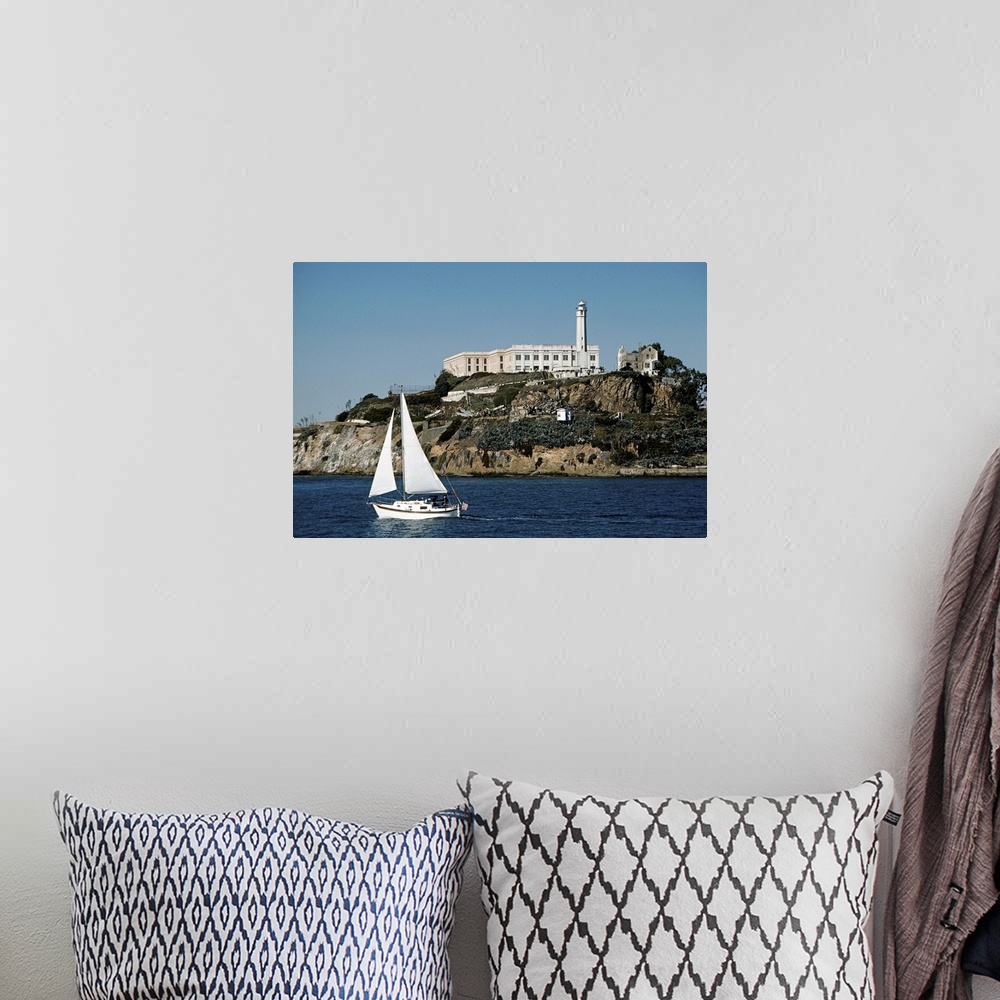 A bohemian room featuring Sailboat Floating by Alcatraz