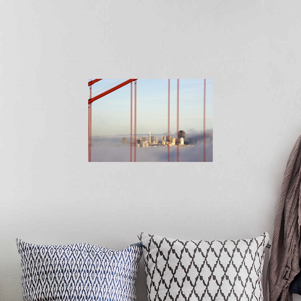 A bohemian room featuring San Francisco in fog through Golden Gate Bridge.