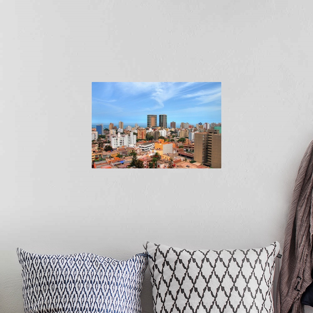 A bohemian room featuring Skyline of Miraflores district of Lima, Peru with Pacific Ocean behind
