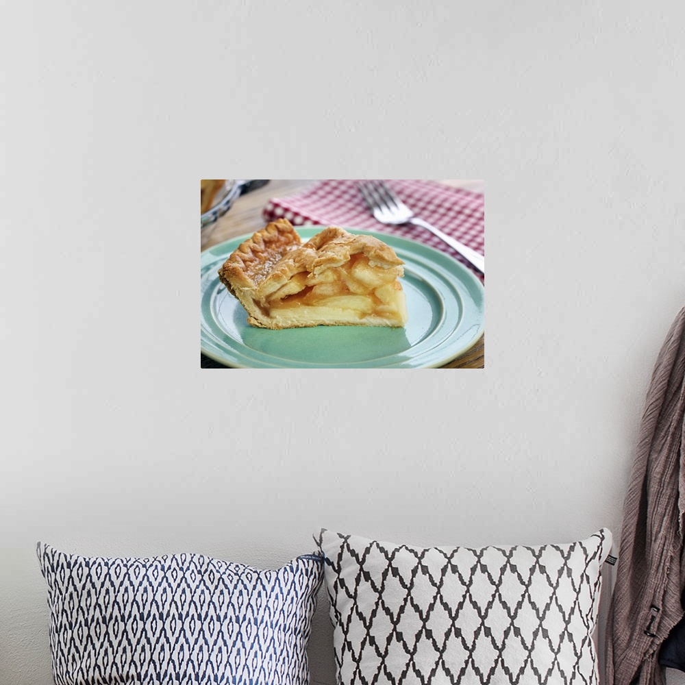 A bohemian room featuring Slice of fresh baked apple pie on plate