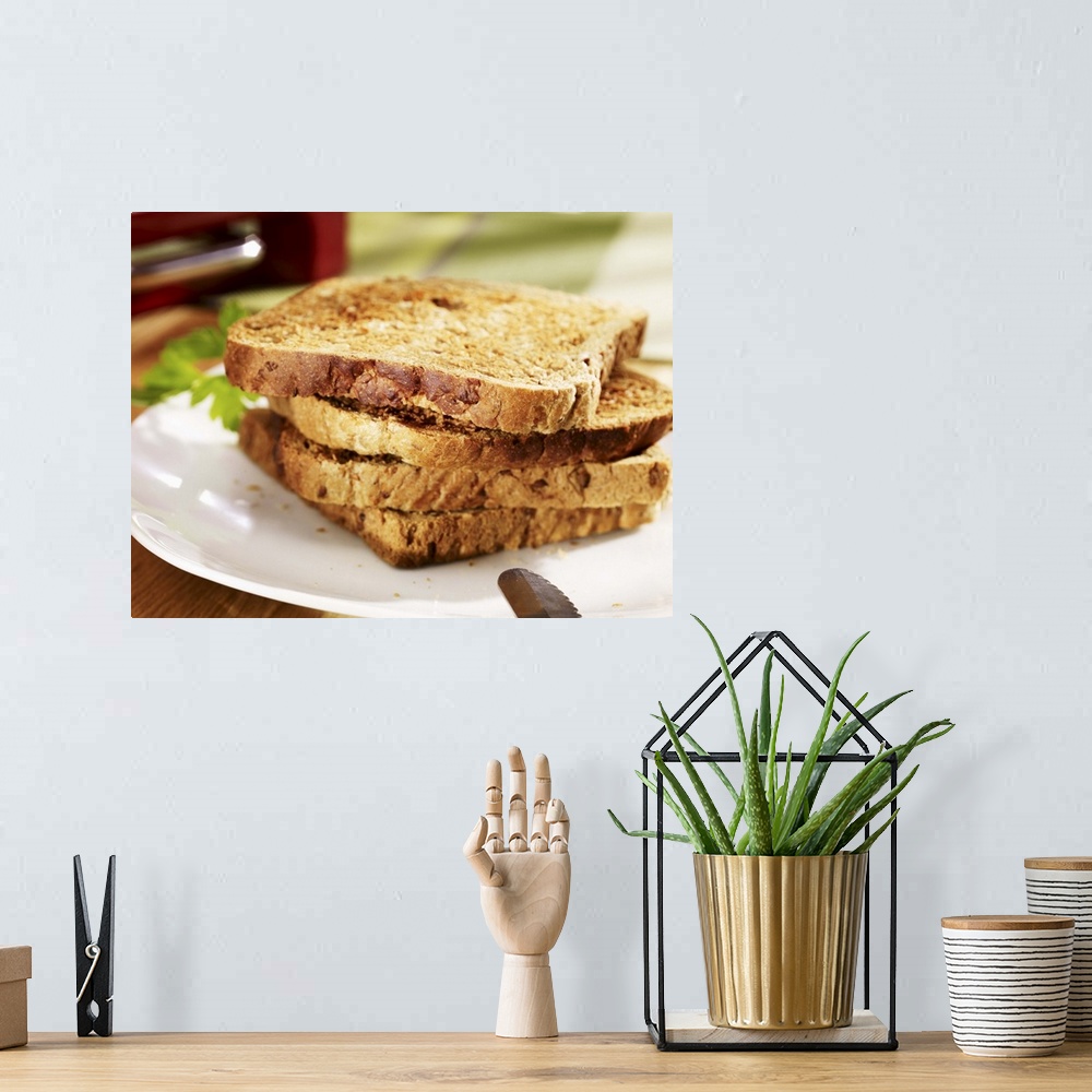 A bohemian room featuring Stacked toast on plate, close-up