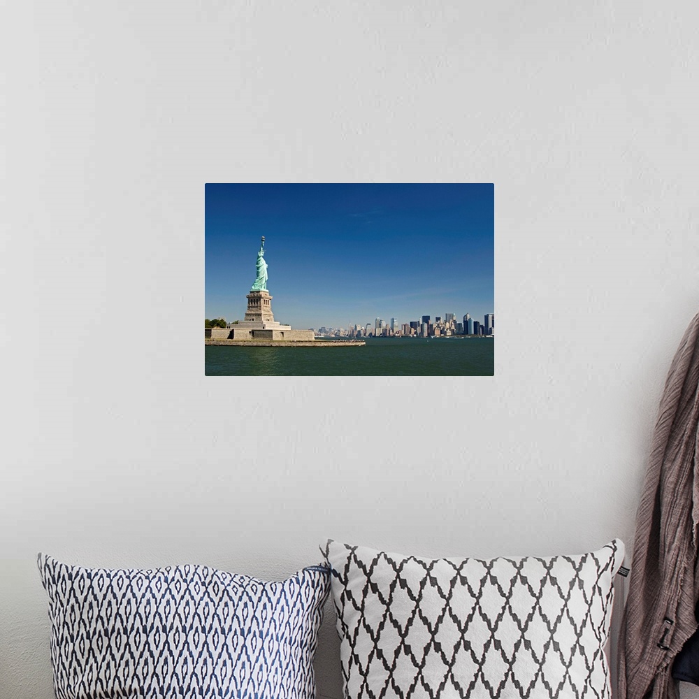 A bohemian room featuring Statue Of Liberty, Liberty Island And New York Skyline