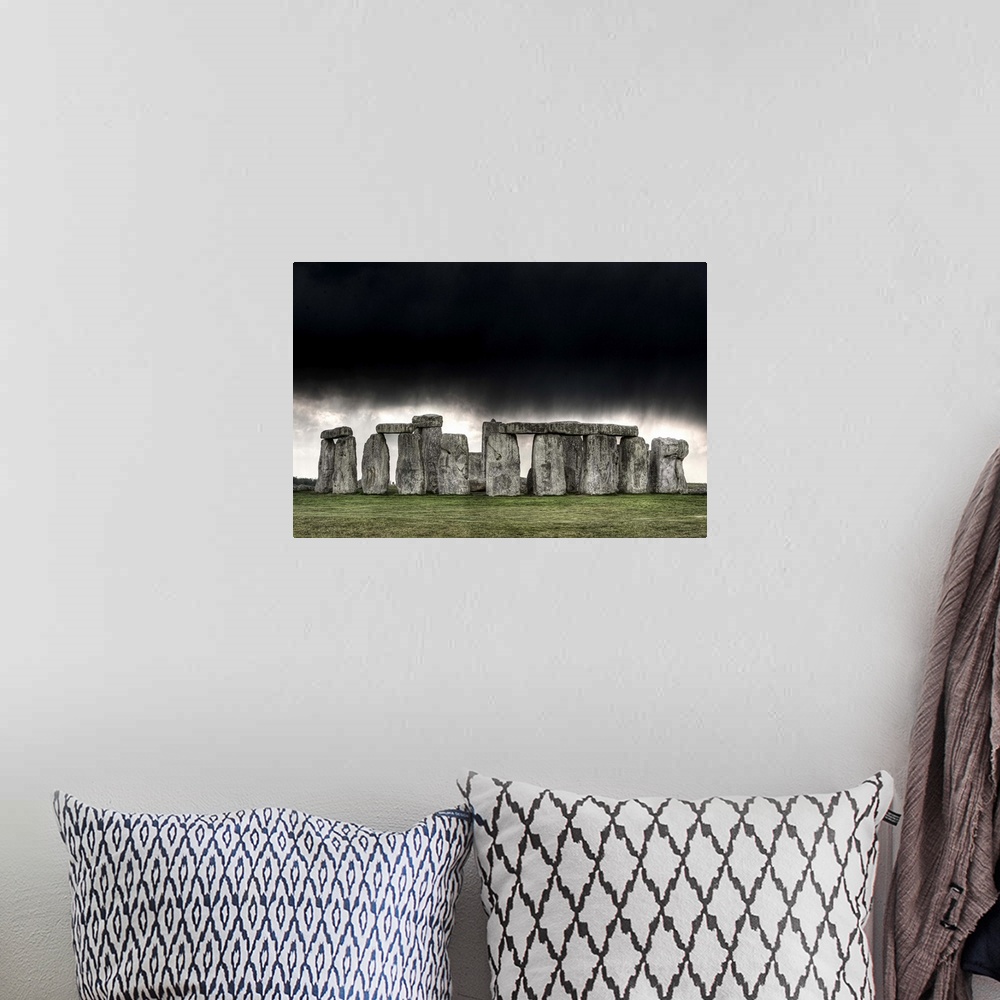 A bohemian room featuring Most famous sites in world, Stonehenge is composed of earthworks surrounding  circular setting of...
