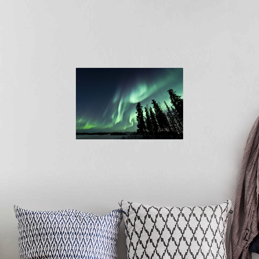 A bohemian room featuring Strong aurora over Walsh Lake, Northwest Territories, Canada.