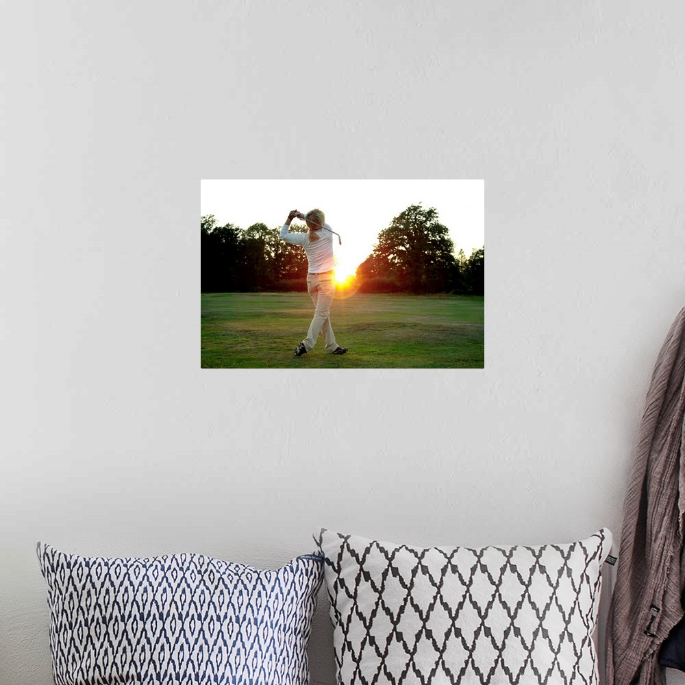 A bohemian room featuring Sunset golf swing