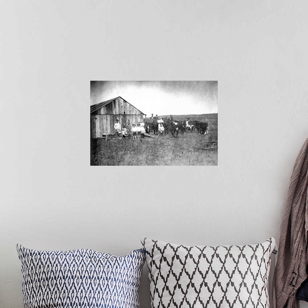 A bohemian room featuring Vintage image of people and livestock on farm