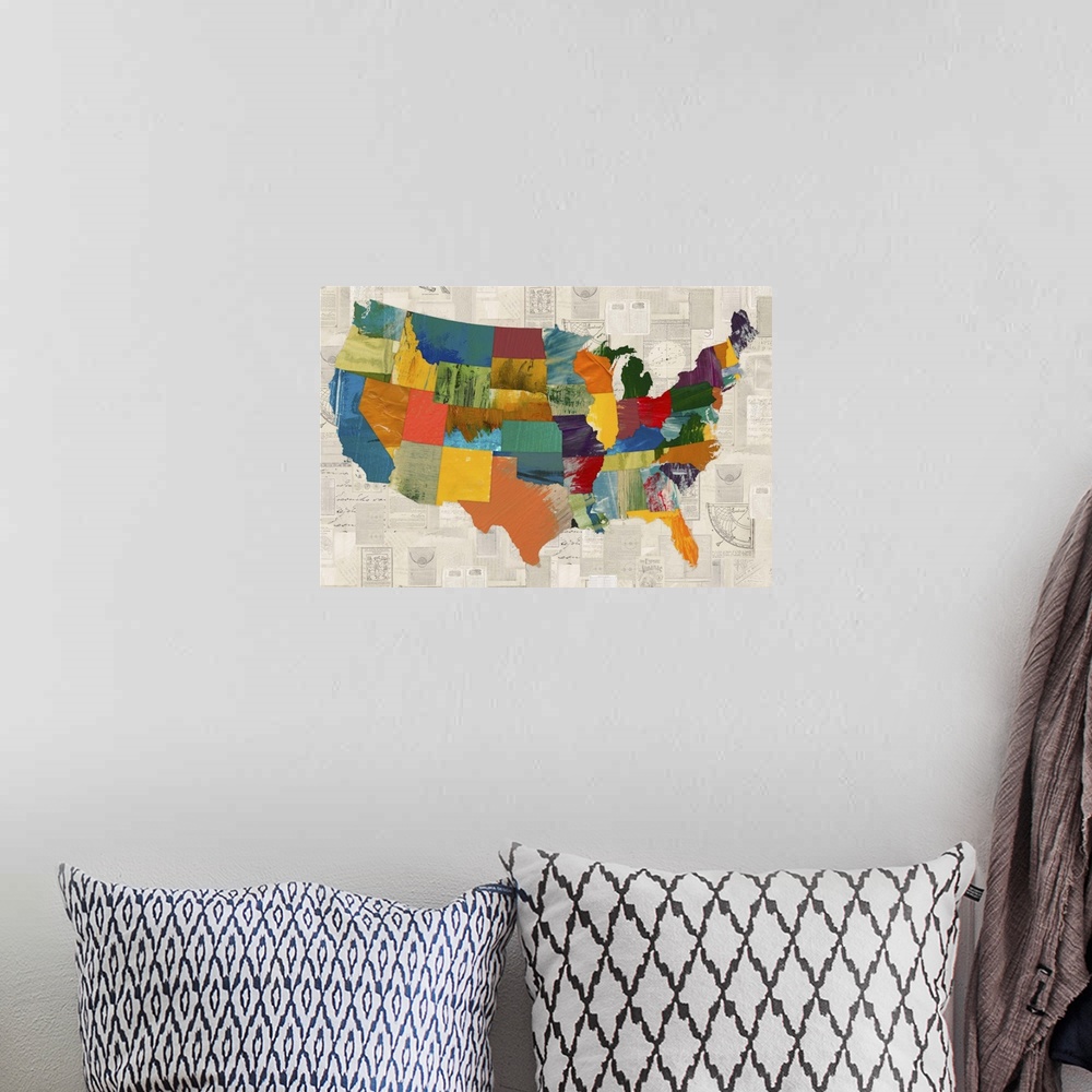 A bohemian room featuring A map of the United States with each state in a different pattern and color.