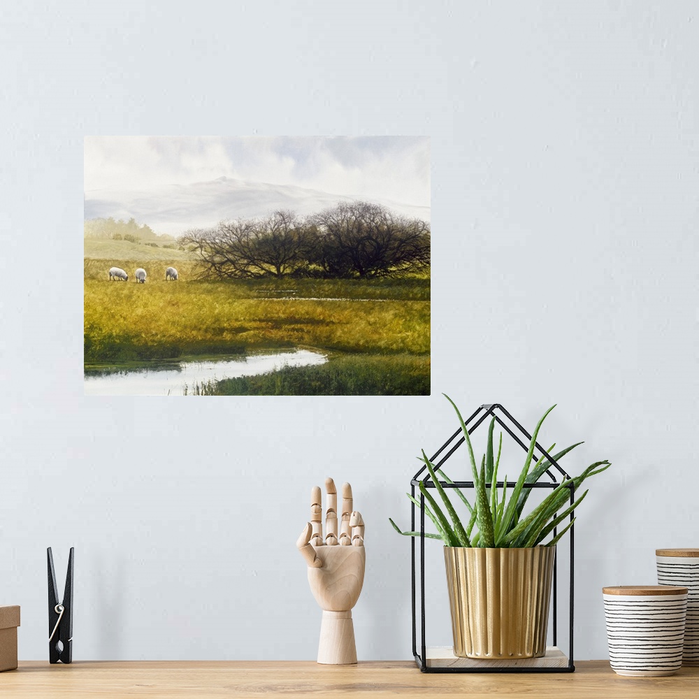 A bohemian room featuring Contemporary painting of a countryside field with a river flowing through the middle and three sh...