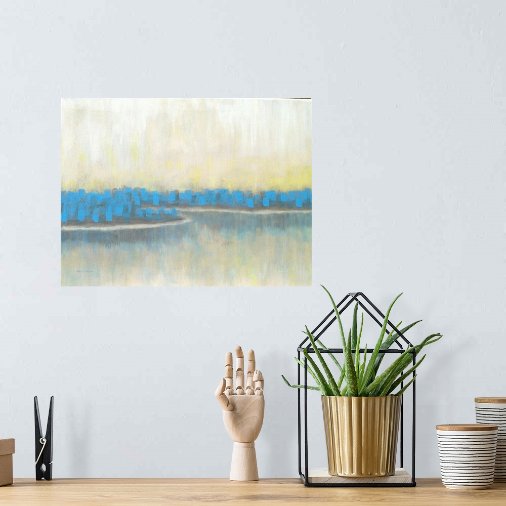 A bohemian room featuring Abstract landscape painting of a lake lined with blue trees.