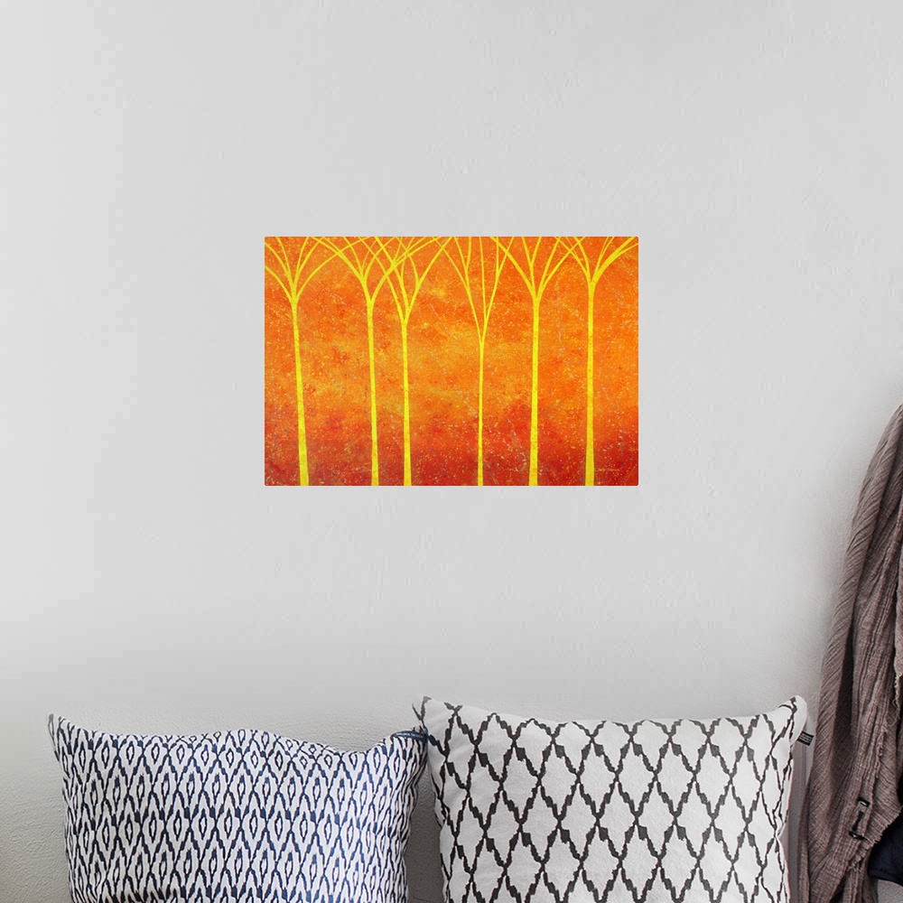 A bohemian room featuring Warm landscape with bright yellow trees on an orange and red background with faint paint splatter.