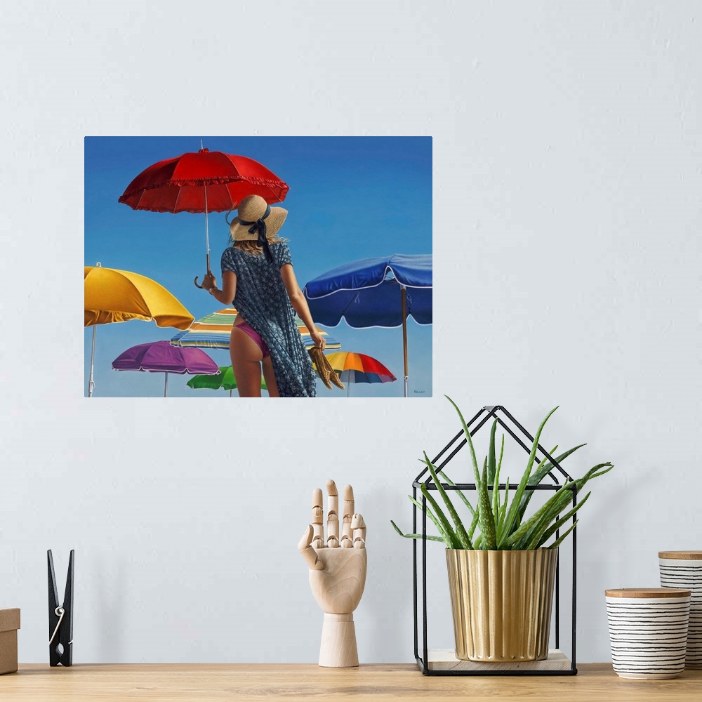 A bohemian room featuring A contemporary painting of a woman standing with beach canopies and holding a red umbrella.