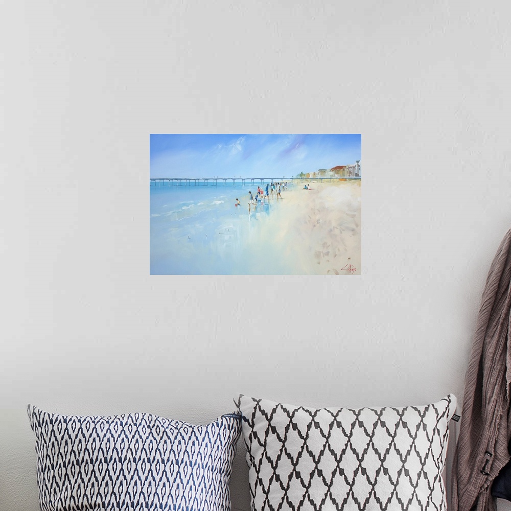 A bohemian room featuring Painting of people playing in the ocean at low tide.