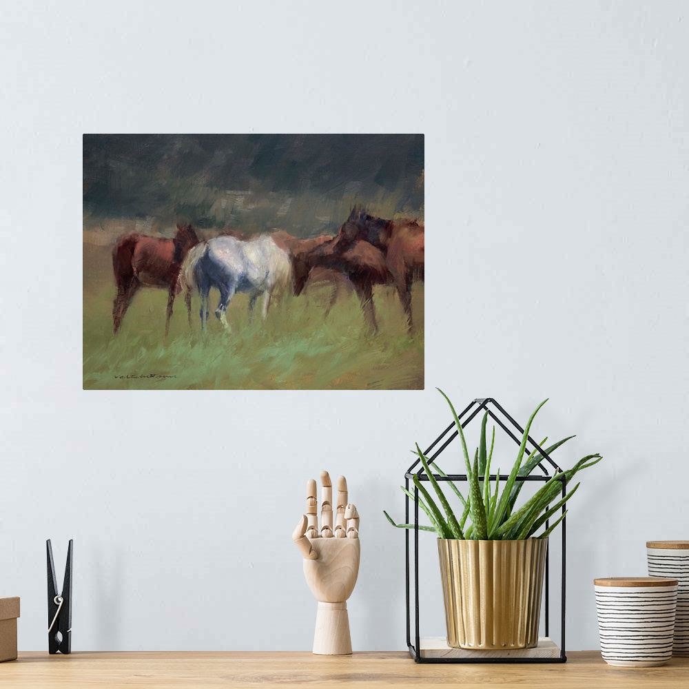 A bohemian room featuring A contemporary painting of a group on horses in a field.