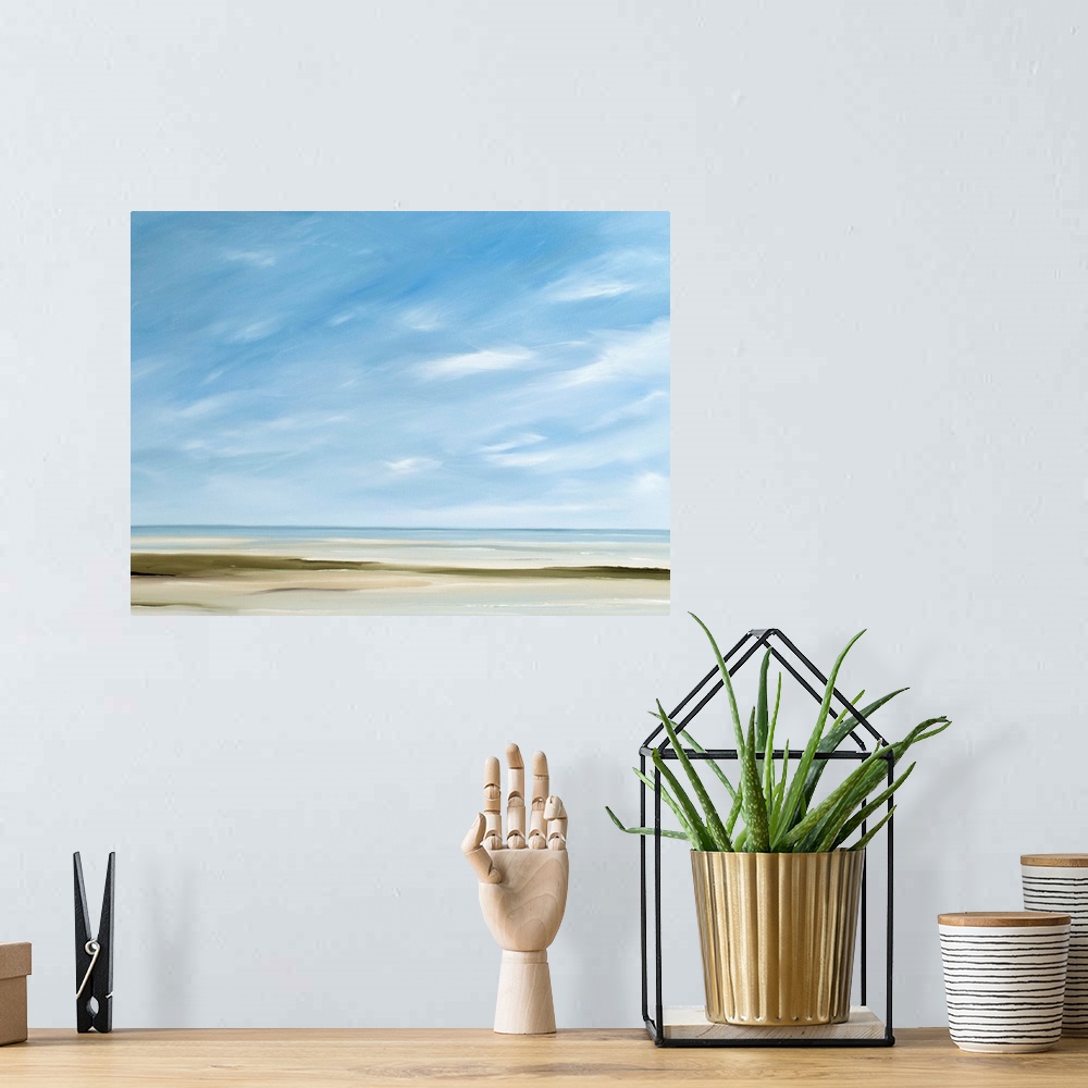 A bohemian room featuring A contemporary painting of a calm beach scene.