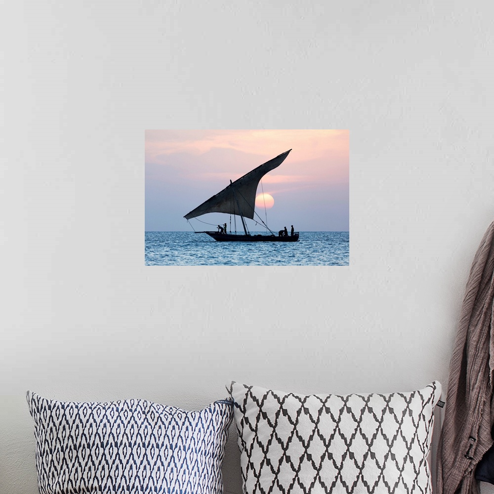 A bohemian room featuring A Dhow Sails In Front Of The Setting Sun, Stone Tpwn, Zanzibar, Tanzania