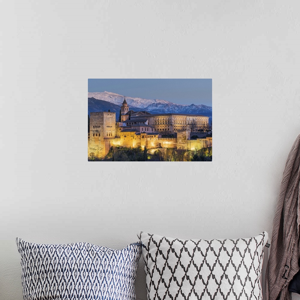 A bohemian room featuring View at dusk of Alhambra palace with the snowy Sierra Nevada in the background, Granada, Andalusi...