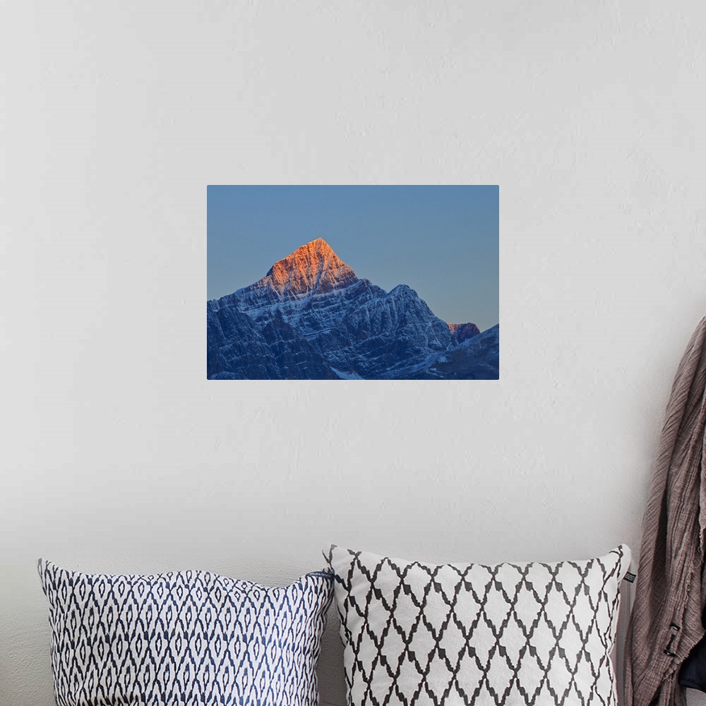 A bohemian room featuring First light on a peak of the Canadina Rocky Mountains, Icefields Parkway, Jasper National Park, A...