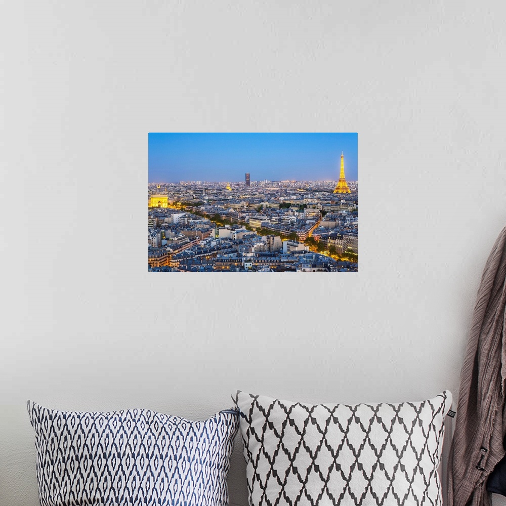 A bohemian room featuring City, Arc de Triomphe and the Eiffel Tower, viewed over rooftops, Paris, France, Europe.