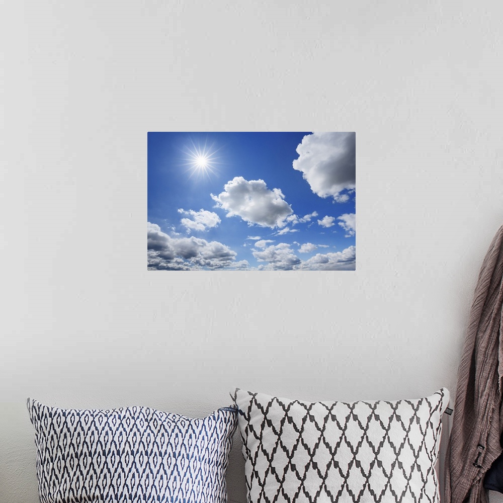 A bohemian room featuring Cloud impression with sun. Germany, Bavaria, Upper Bavaria, Freising, Giggenhausen. Bavaria, West...