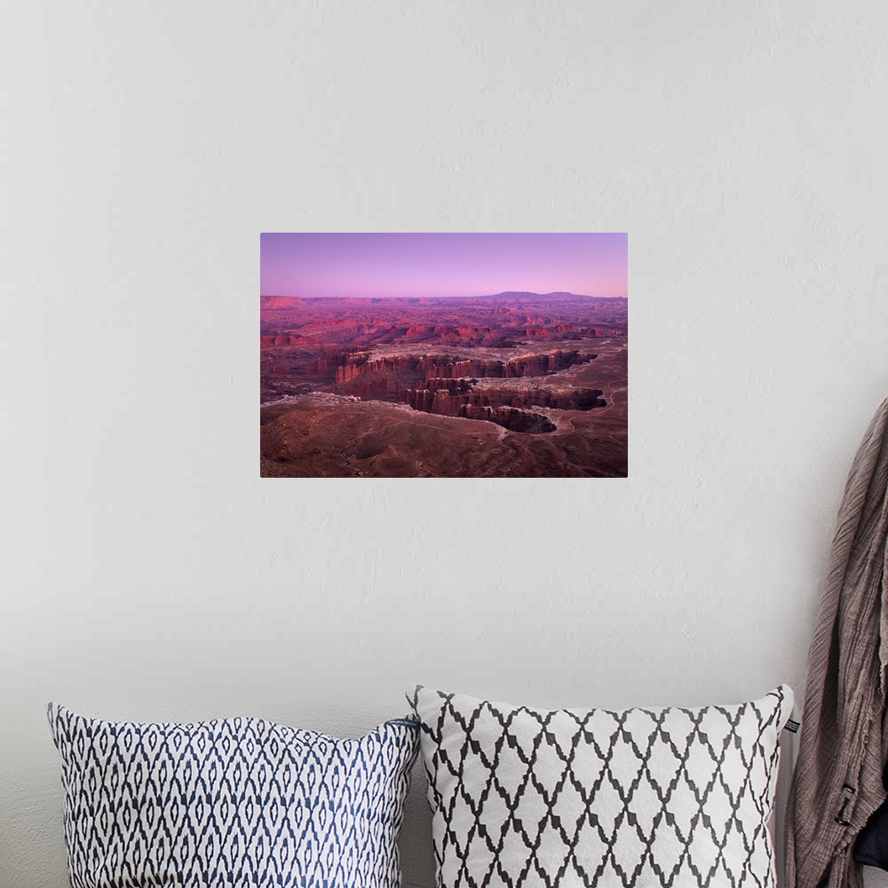 A bohemian room featuring Dramatic canyon terrain at Grand View Point at sunset, Canyonlands National Park, Utah, USA