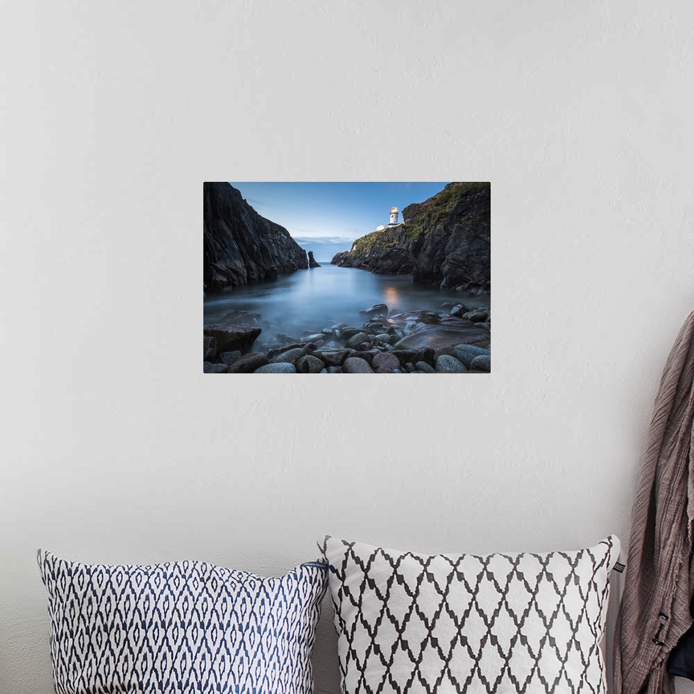 A bohemian room featuring Fanad Head (Fanaid) lighthouse, County Donegal, Ulster region, Ireland, Europe. View of the light...
