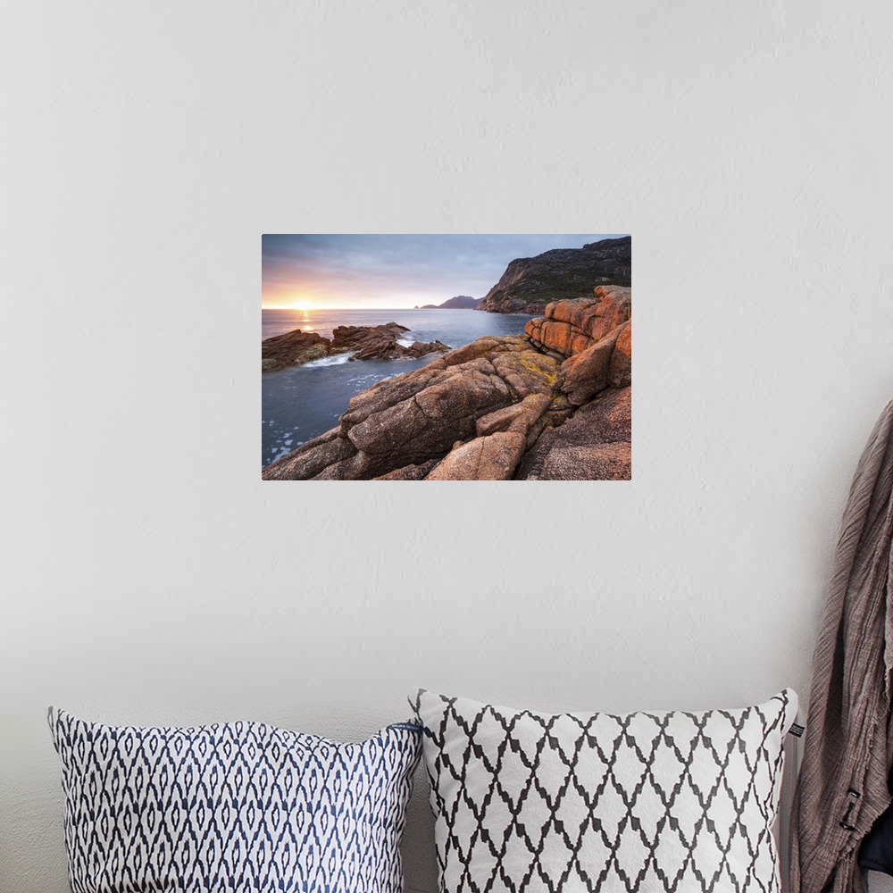 A bohemian room featuring Freycinet National Park, Tasmania, Australia. Sunrise over the coastline