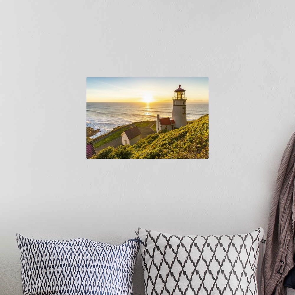 A bohemian room featuring Heceta Head Lighthouse at sunset. Florence, Lane county, Oregon, USA.