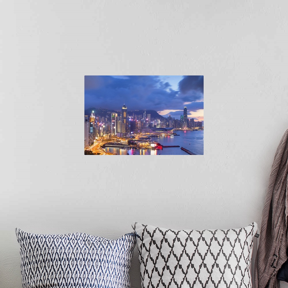 A bohemian room featuring Hong Kong Island skyline at sunset, Hong Kong.