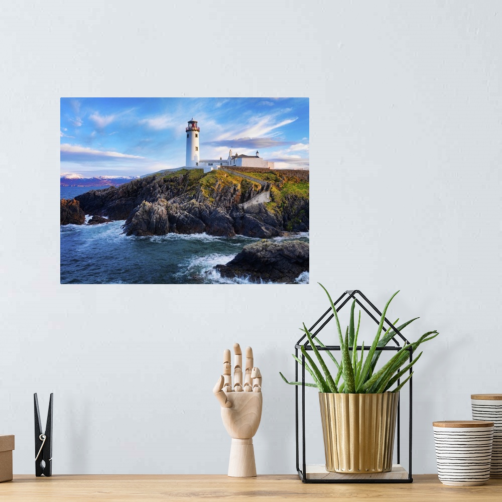 A bohemian room featuring Ireland, County Donegal, Fanad, Fanad lighthouse at dusk.