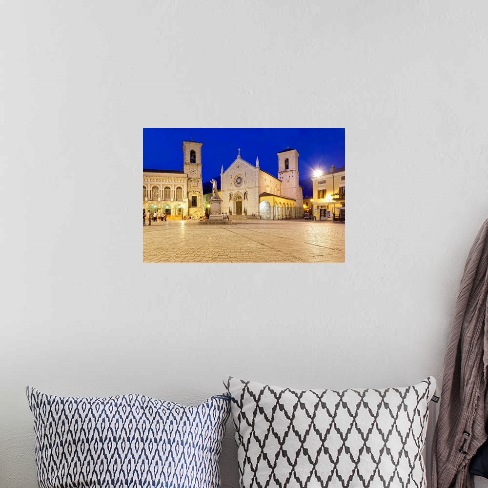 A bohemian room featuring Italy, Umbria, Perugia district, Monti Sibillini National Park, Norcia, Piazza San Benedetto