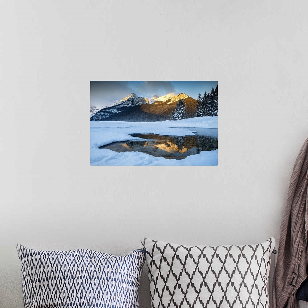 A bohemian room featuring Lake Louise Reflections in Winter, Alberta, Canada.