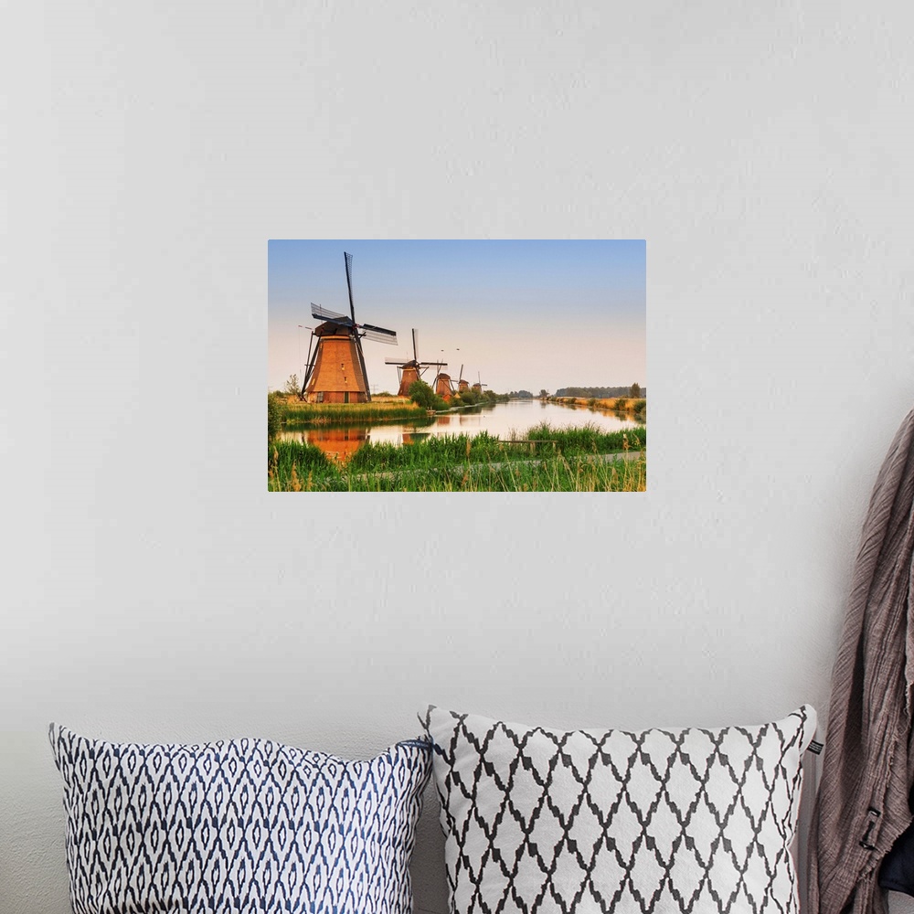 A bohemian room featuring Netherlands, South Holland, Kinderdijk. Windmills