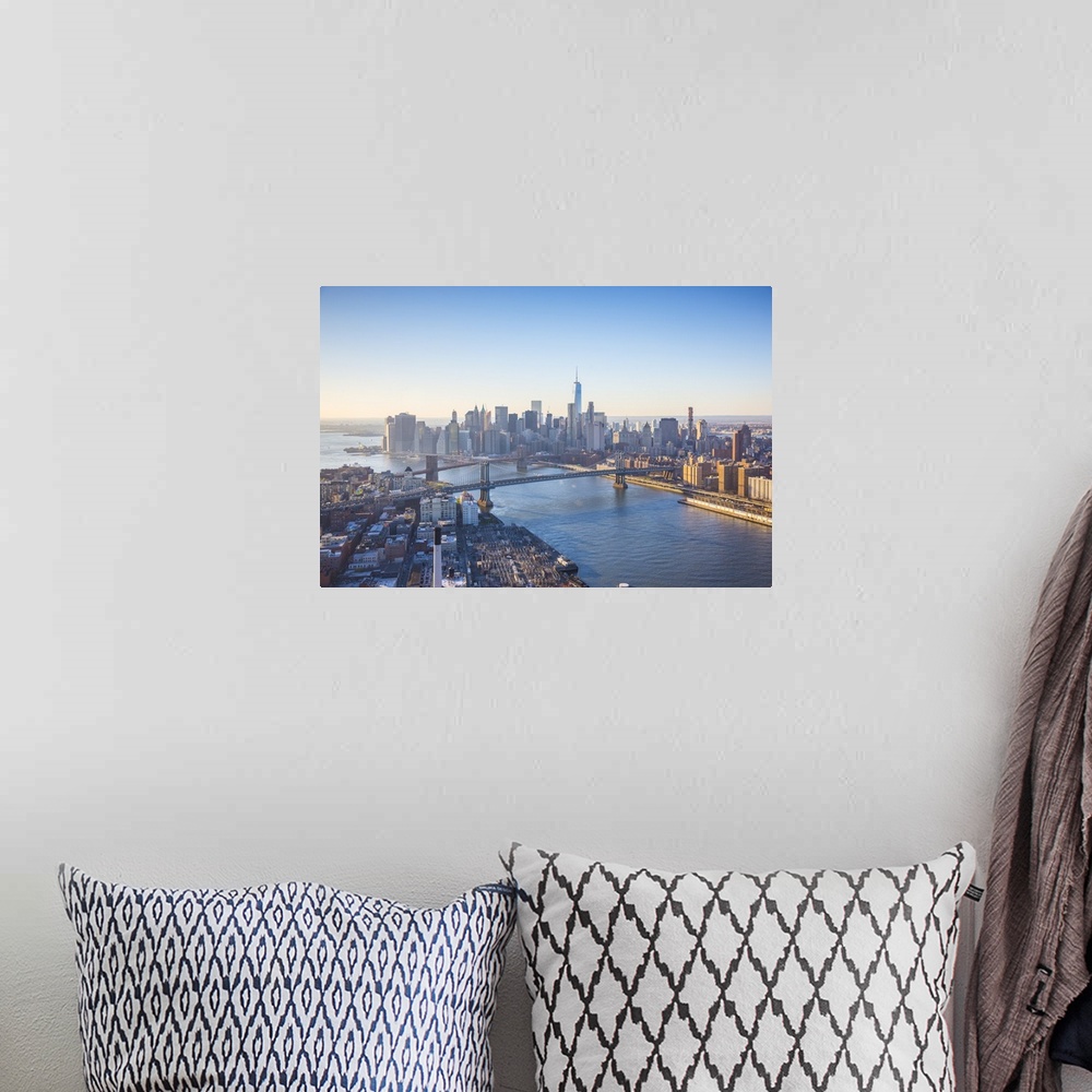 A bohemian room featuring One World Trade Center, Manhattan and Brooklyn Bridges, Manhattan, New York City, New York, USA.