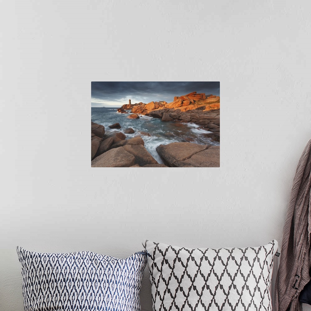 A bohemian room featuring Pink Granite coast, Brittany, France. The Ploumanach lighthouse (Men Ruz) an sunset.
