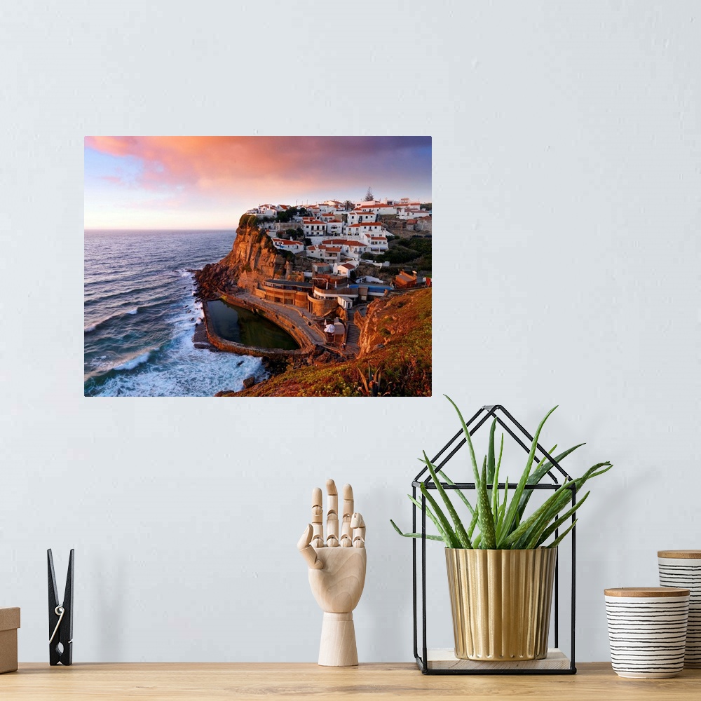 A bohemian room featuring Portugal, Sintra, Azehas do Mar, Overview of town at dusk