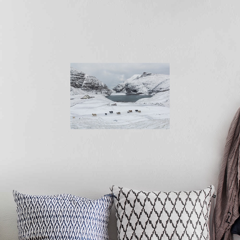 A bohemian room featuring Saksun covered by snow in the mid of May. Streymoy, Faroe Islands