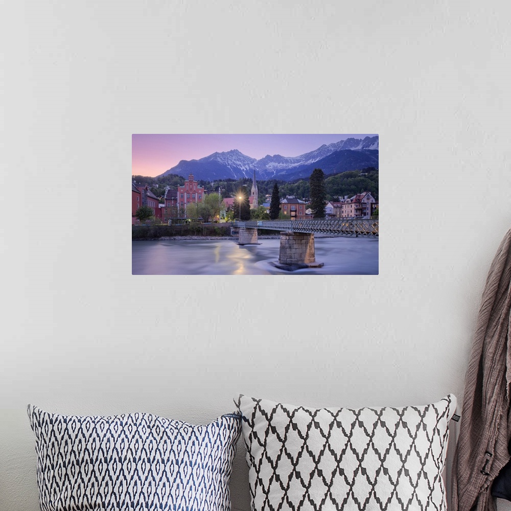 A bohemian room featuring Sankt Nikolaus district at dusk with the Nordkette mountain range in the background, Innsbruck, T...