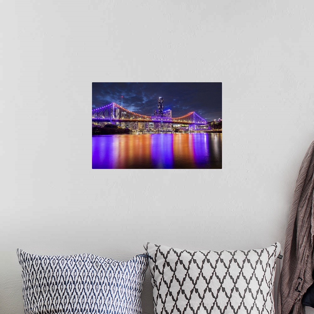 A bohemian room featuring Story Bridge and Brisbane River at dusk, Brisbane, Queensland, Australia.