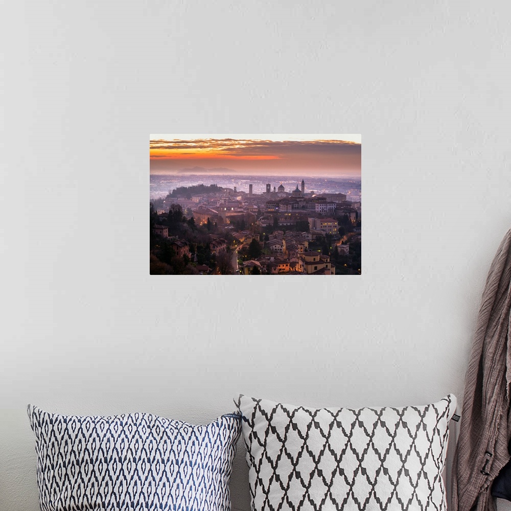 A bohemian room featuring Sunrise in Citta Alta, Bergamo, Bergamo province, Lombardy district, Italy, Europe.