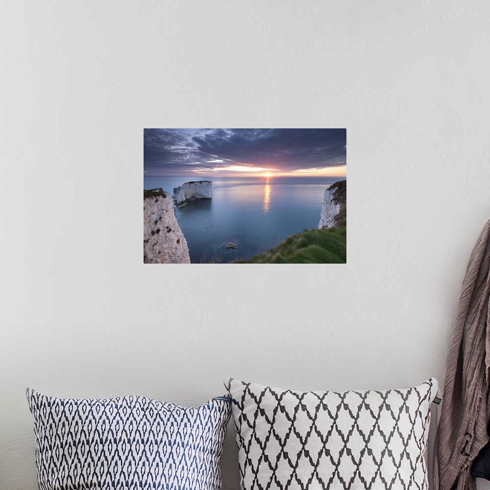 A bohemian room featuring Sunrise over Old Harry Rocks, Jurassic Coast, Dorset, England. Spring
