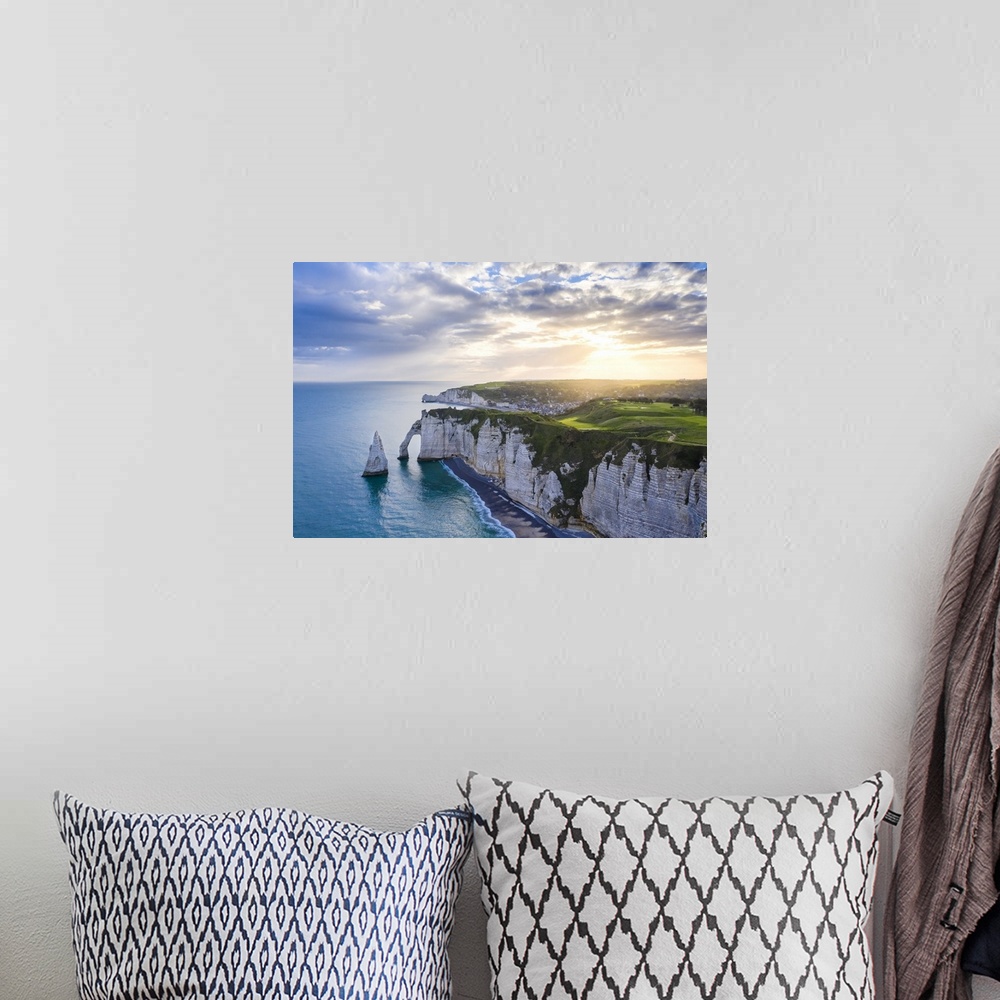 A bohemian room featuring Sunrise over the cliff of Etretat, Octeville sur Mer, Le Havre, Seine Maritime, Normandy, France,...