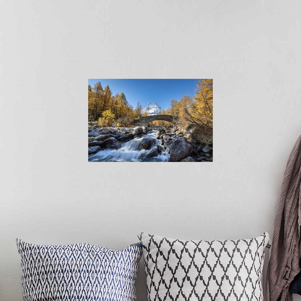 A bohemian room featuring The river Cairasca and Monte Leone in the background during autumn, Alpe Veglia, Val Cairasca val...