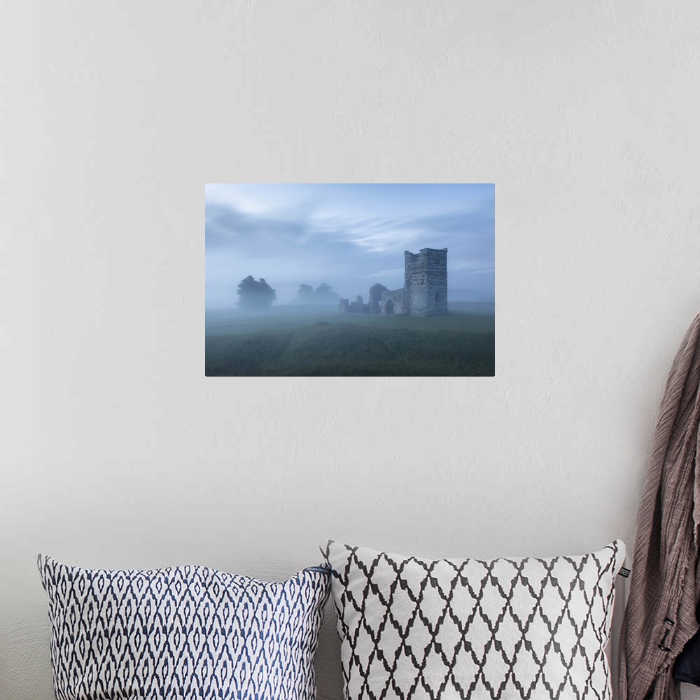 A bohemian room featuring The ruins of Knowlton Church at dawn, Knowlton, Dorset, England, UK.