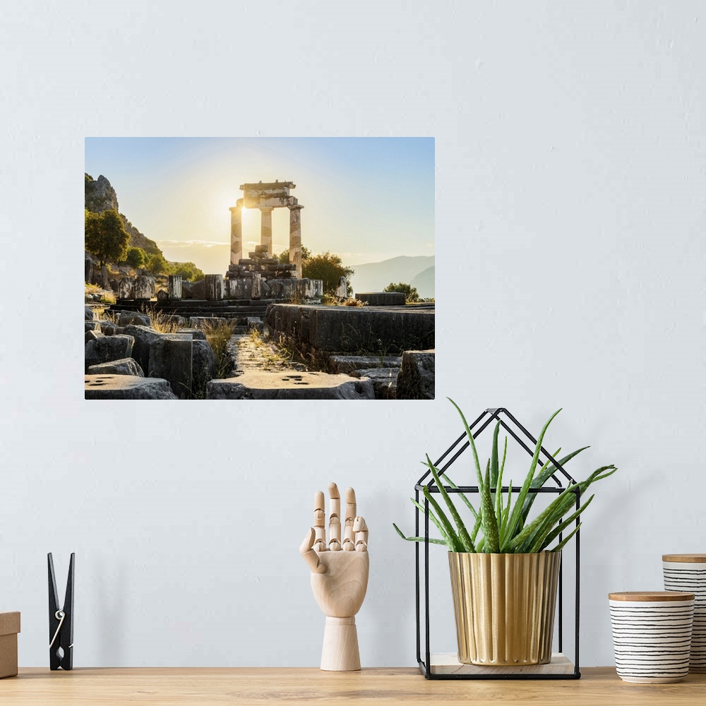 A bohemian room featuring Tholos of Delphi, Temple of Athena Pronaia, sunrise, Delphi, Phocis, Greece